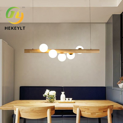 مصباح مطعم النمط الشمالي الخشبي الصلب بسيط حديث LED بار إبداعي ثريا